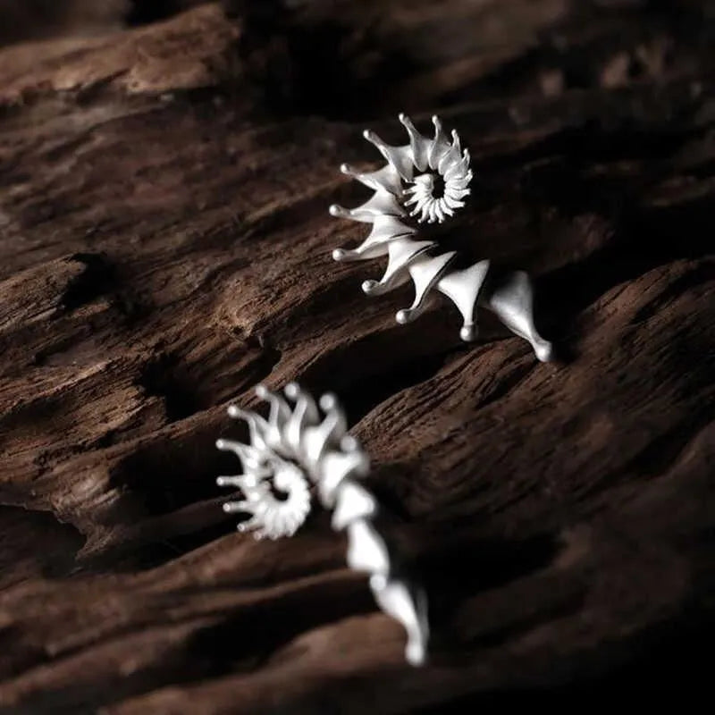 Matte finish conch shell ear studs with three-dimensional design and irregular edges