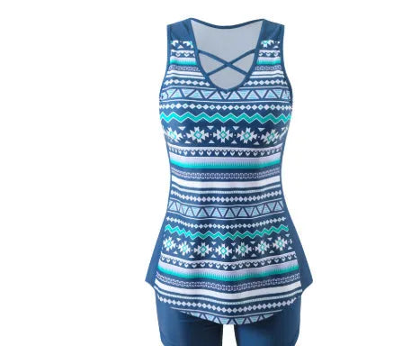 Women's blue printed lace two-piece swimsuit top and shorts laid flat.