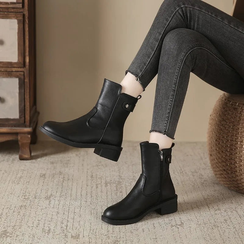 Women's black side zip ankle boots with round toe and low rubber sole
