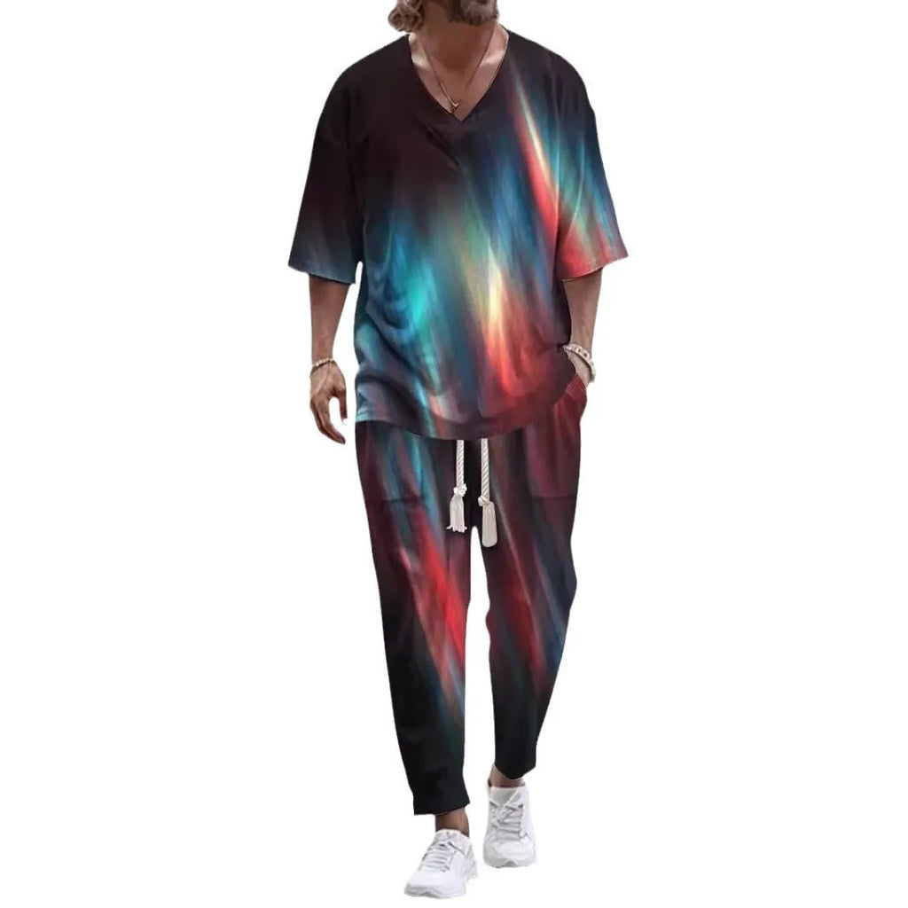 Thin polyester trousers suit with V-neck cropped sleeve jacket and matching trousers on a hanger.