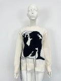 Women's loose fit alpaca wool sweater with tassel design and abstract pattern in street fashion style