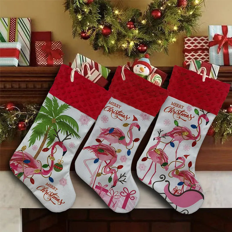 Red cloth Christmas stocking with flamingo design, 46cm long, hanging on fireplace.