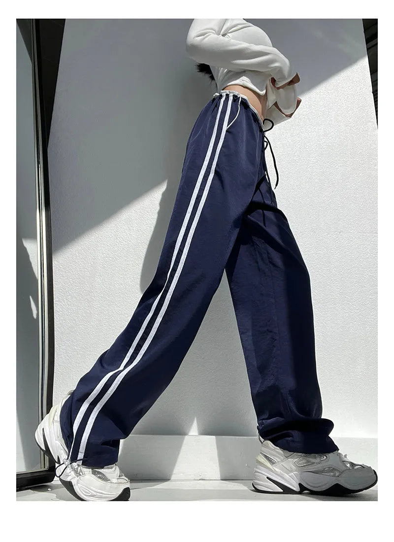 Women's slim straight trousers with parallel bar pattern in thin ribbed fabric, low waist design