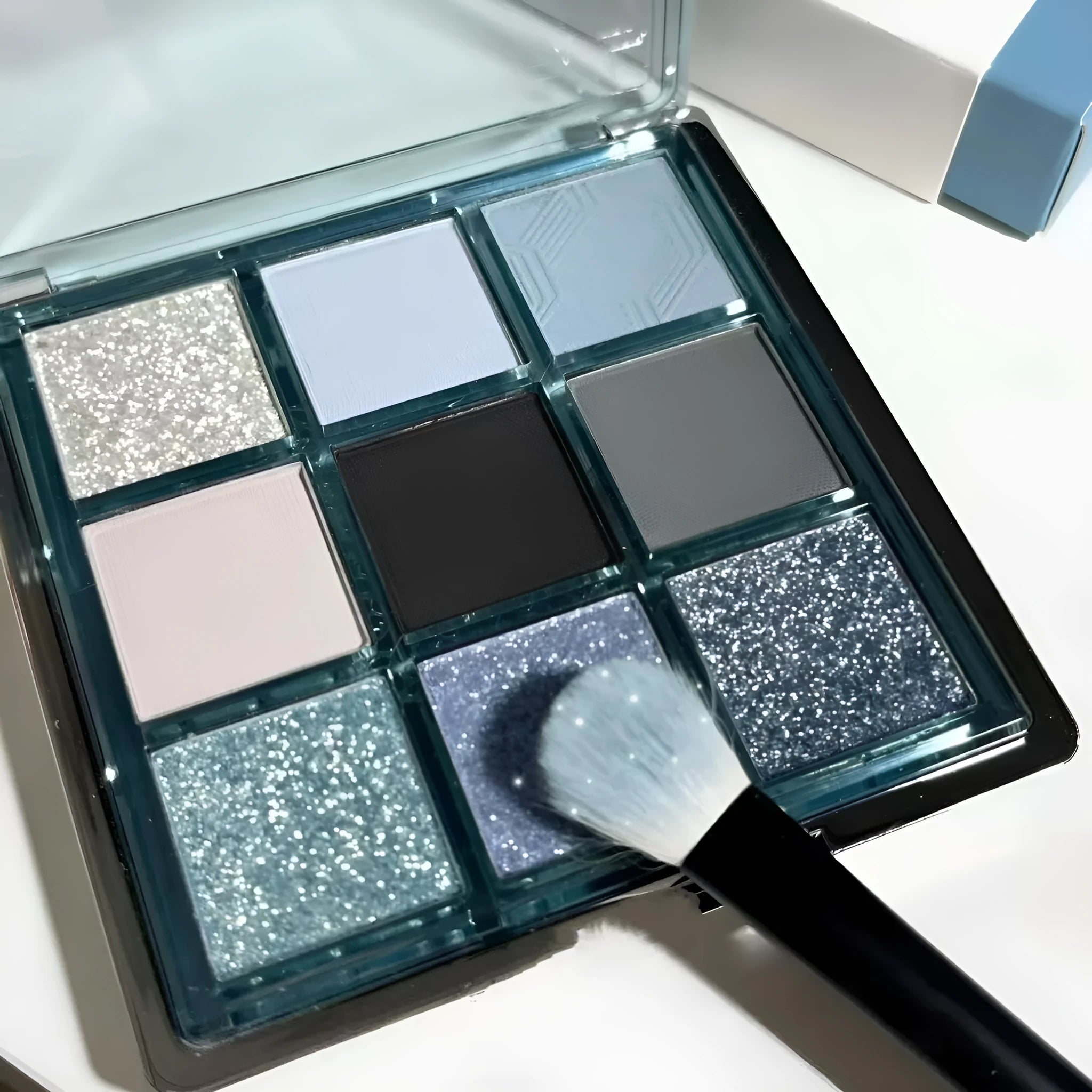 MUGELEEN nine-colour eye shadow palette 08 showing matte and shimmer blue smoked shades