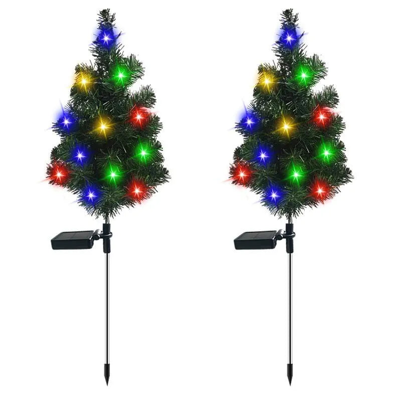 Solar Christmas tree lamp with ABS body placed on grass in a garden setting