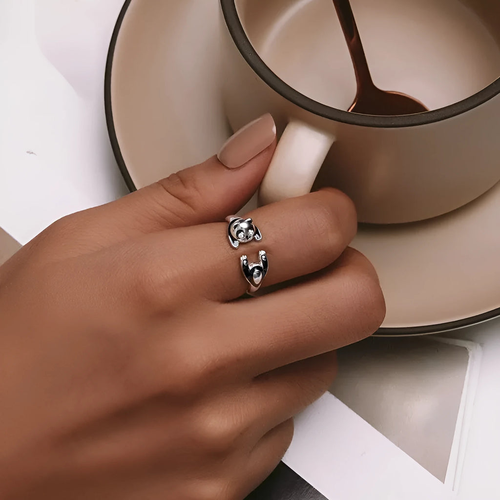 Adjustable sterling silver open ring with white gold plating and a detailed panda design.