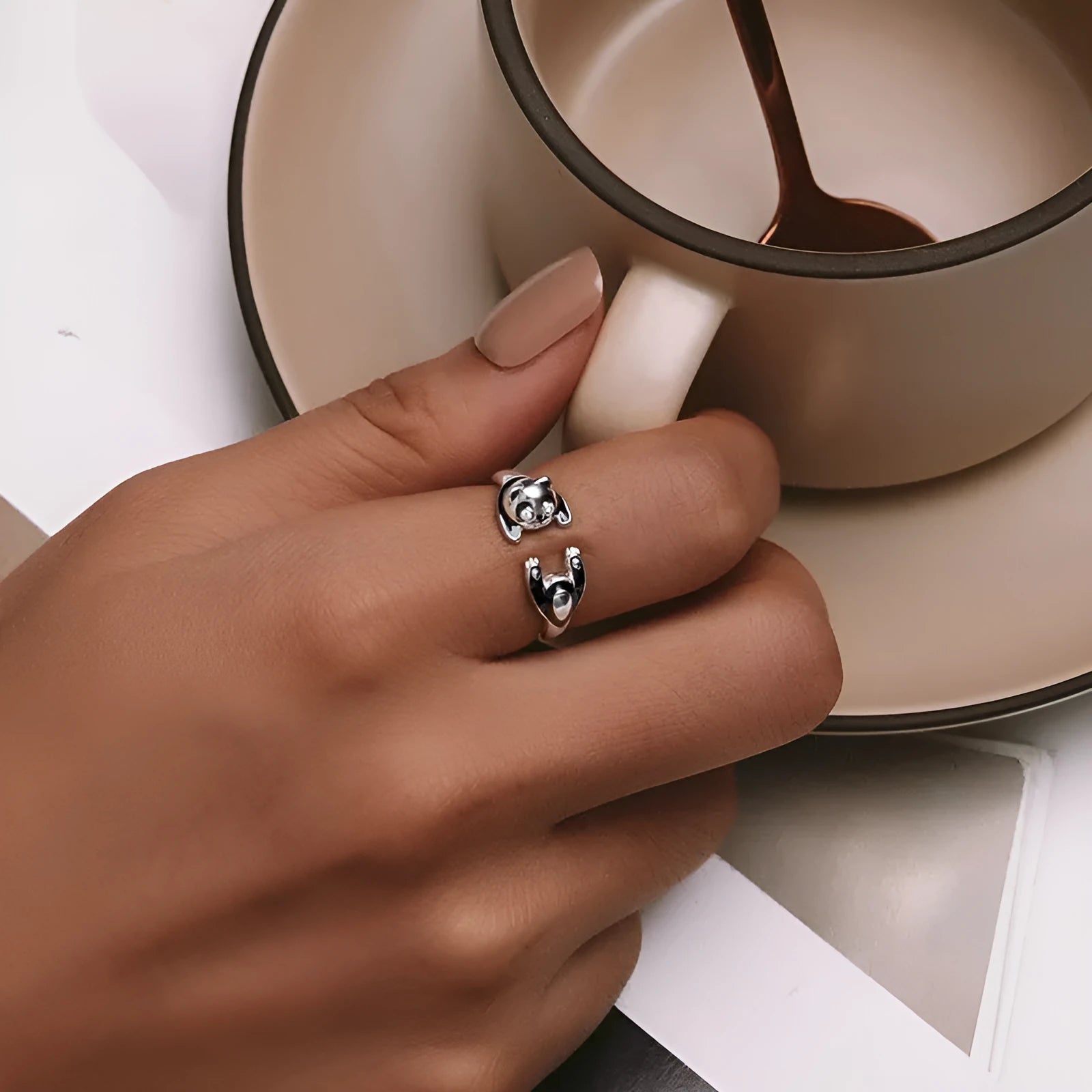 Adjustable sterling silver open ring with white gold plating and a detailed panda design.