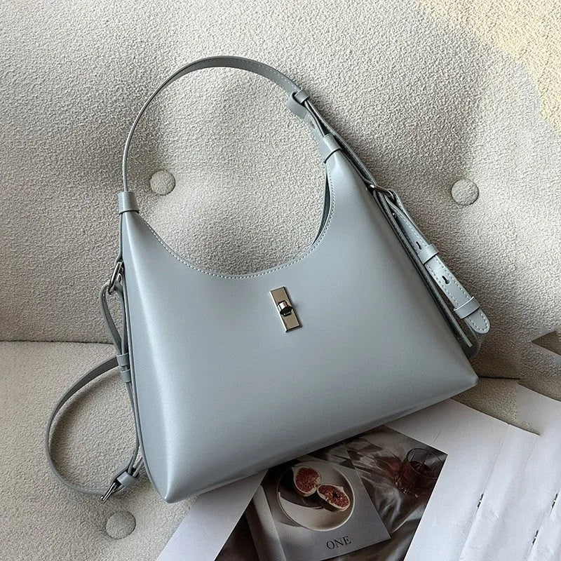 Genuine leather crossbody shoulder bag in dumpling shape with external sandwich pocket
