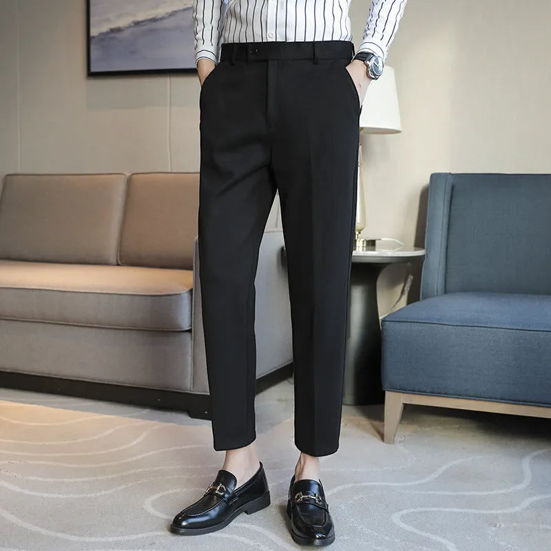 Men's straight fit brown corduroy trousers with elastic waistband on hanger
