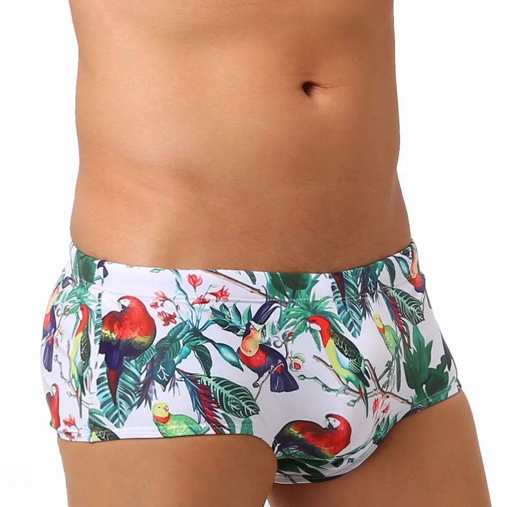 Men's floral print nylon swimming trunks with a cup cover, shown in the 619 flowers and birds colour pattern.