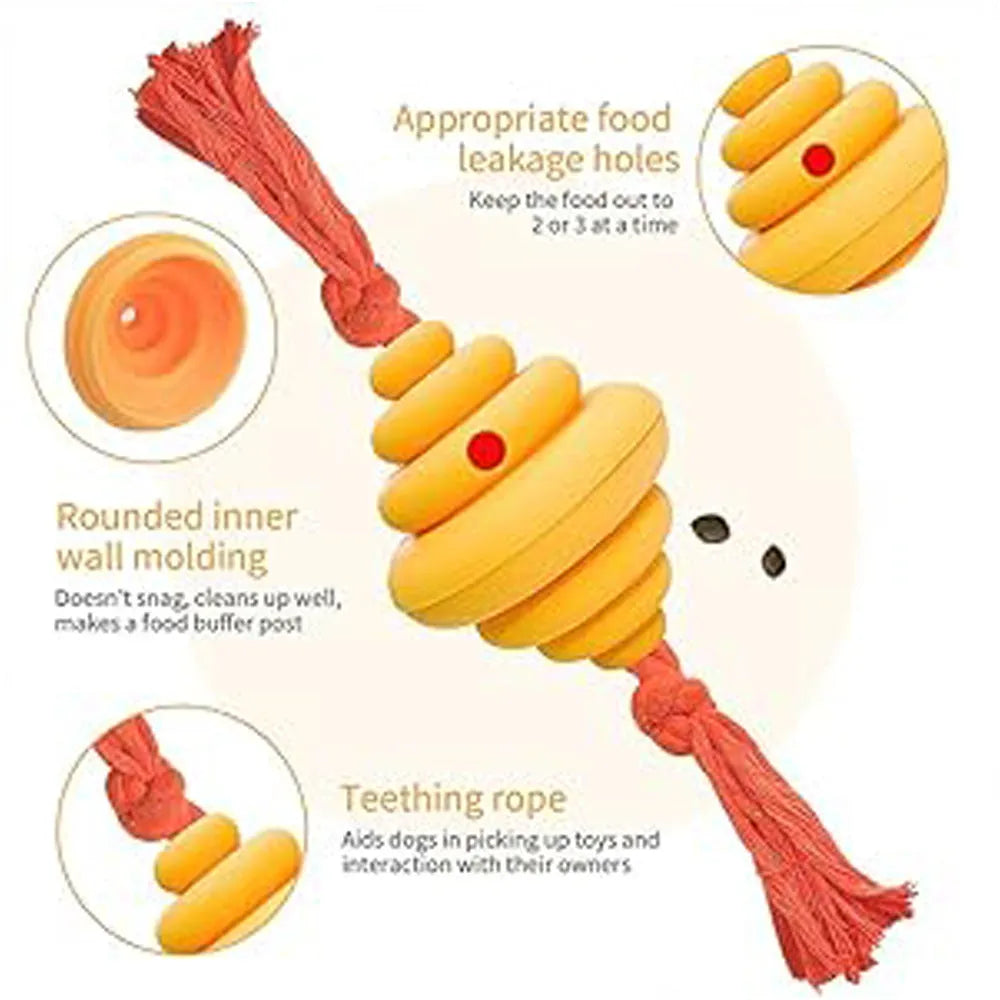 Green and yellow dog ball with attached rope for interactive play and food dispensing