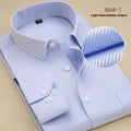 Men's black long sleeve cotton business shirt with a regular slim fit on a hanger.