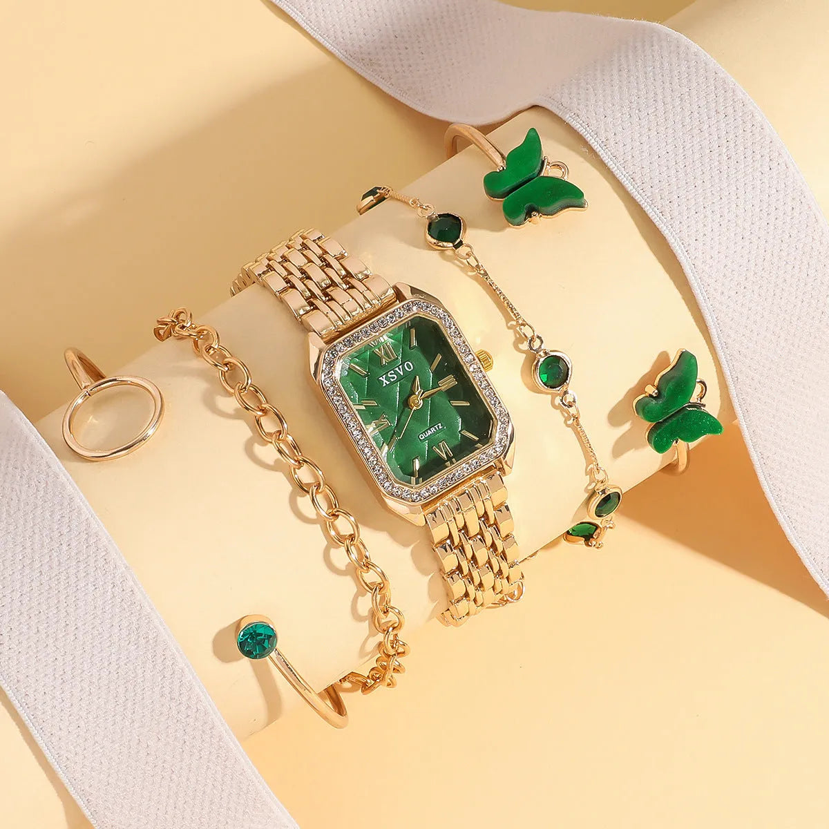 Gold green square women's watch with four matching bracelets showing jewellery buckle and 25mm dial
