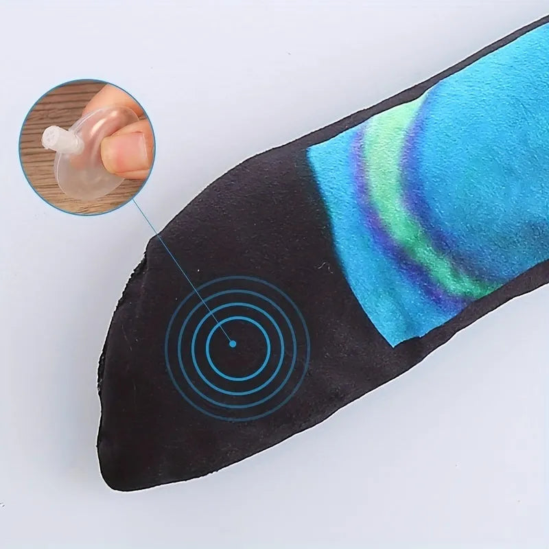 Rainbow stripe snake-shaped plush dog squeaky toy on a white background