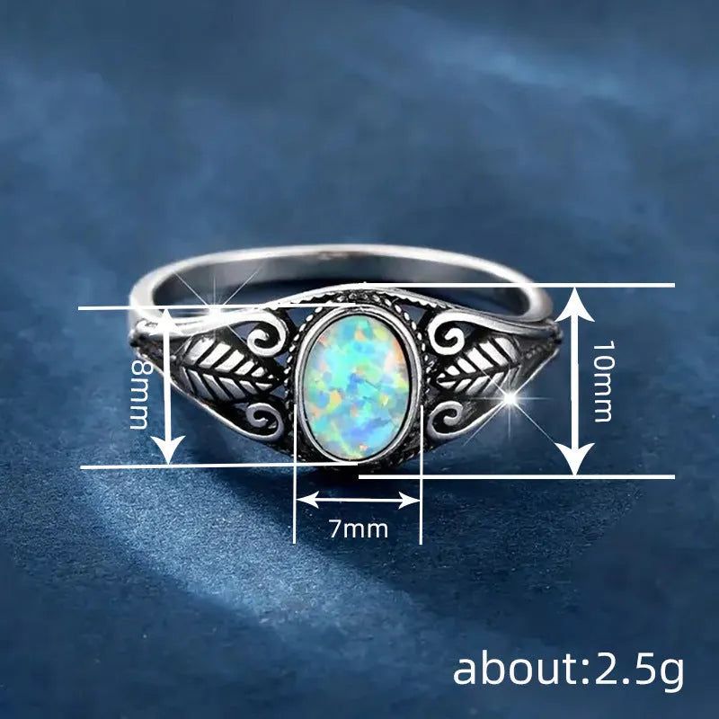 Women's retro distressed metal leaf ring in antique silver copper electroplated finish on finger