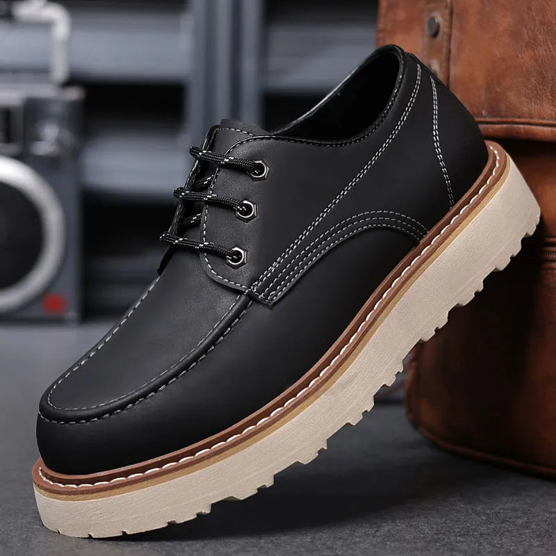 Men's black retro Martin boots with low-top design, round toe, and rubber sole