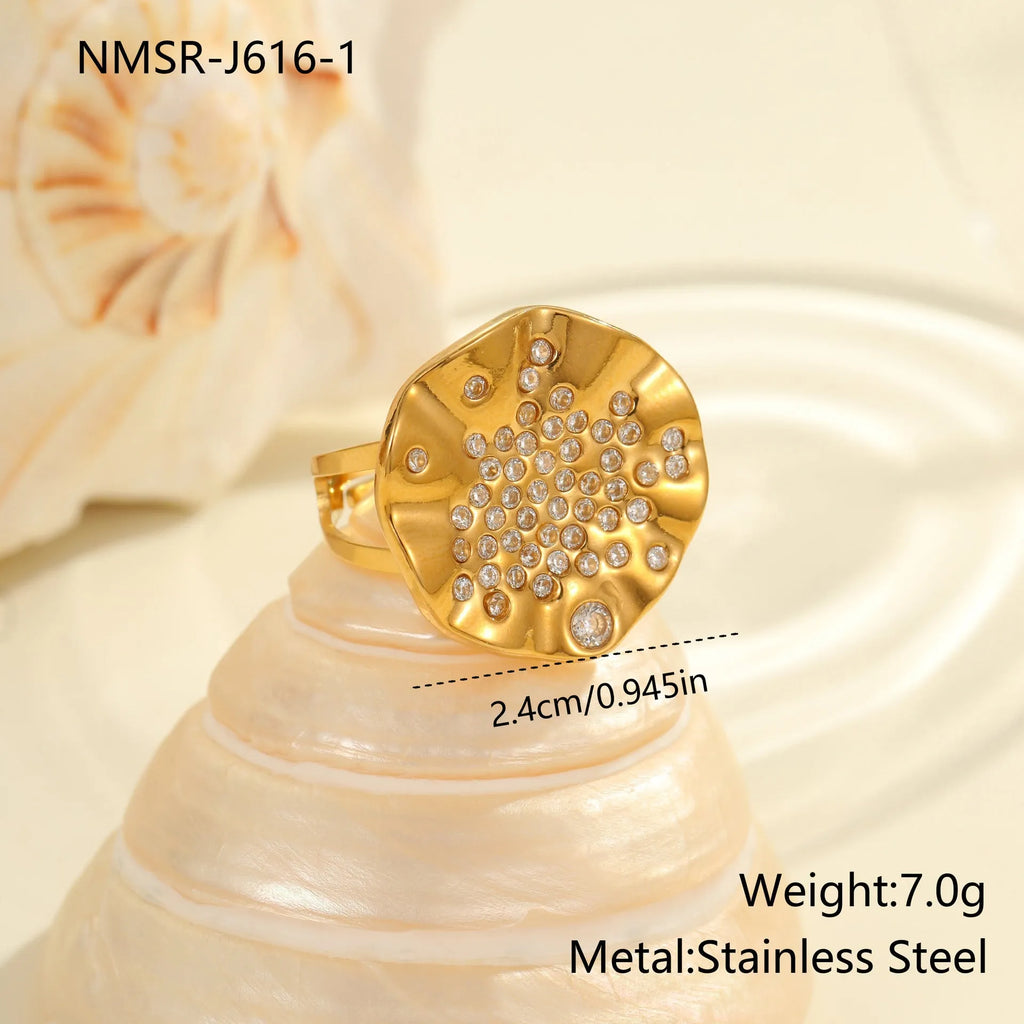 Geometric pleated stainless steel ring with open mouth adjustable design and inlaid coloured crystals