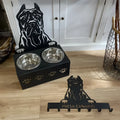 Personalised dog bowl holder with iron dog head base and stainless steel bowl showing custom name engraving