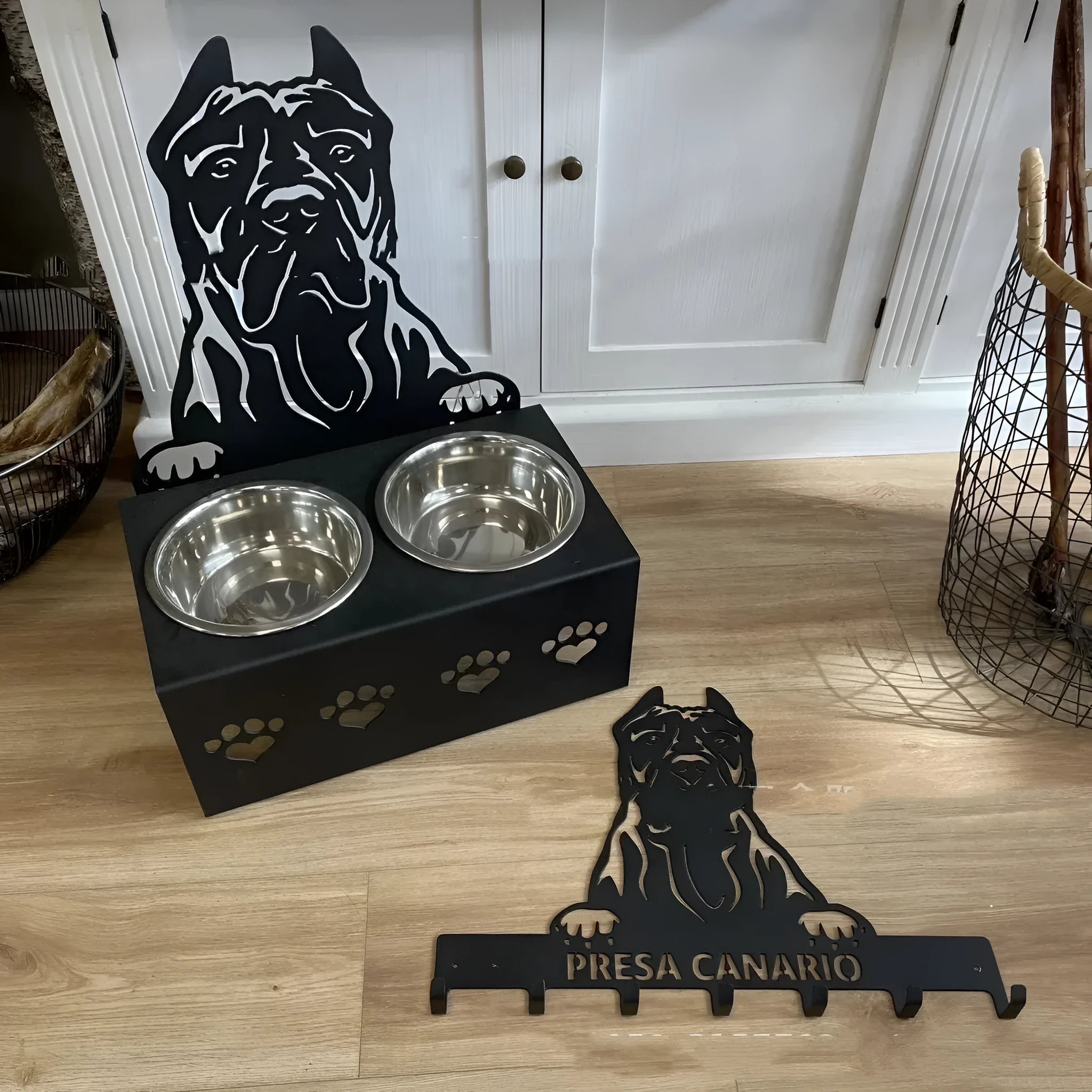 Personalised dog bowl holder with iron dog head base and stainless steel bowl showing custom name engraving