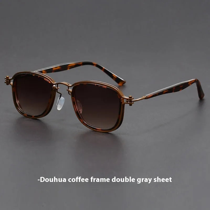 Retro style square sunglasses with a mixed metal and plastic frame and AC lenses.