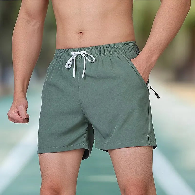 Men's black ice silk polyester fitness training shorts with high waist and drawstring closure