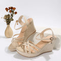 Women's wedge sandals with fish mouth toe design and cloth upper in black colour
