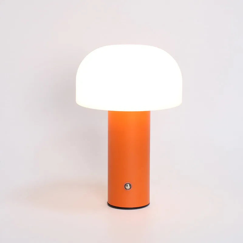Creative plastic table lamp with USB and plug-in power options in black, white, orange, or green.