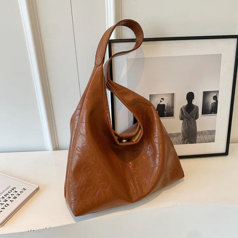 Soft PU leather casual shoulder bag with large capacity and street style design