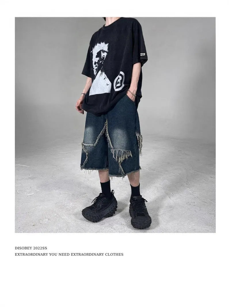 Blue denim shorts with frayed five-pointed star embroidery in loose fit style