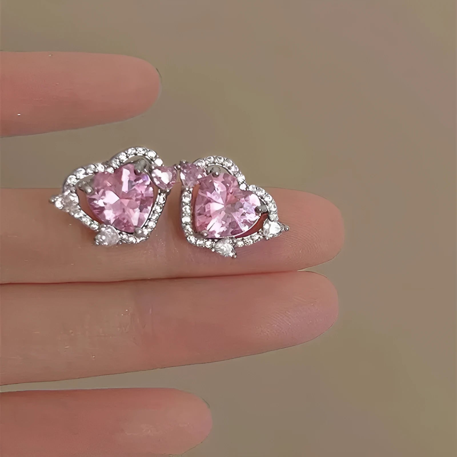 White heart-shaped stud earrings for women with copper construction and electroplated finish