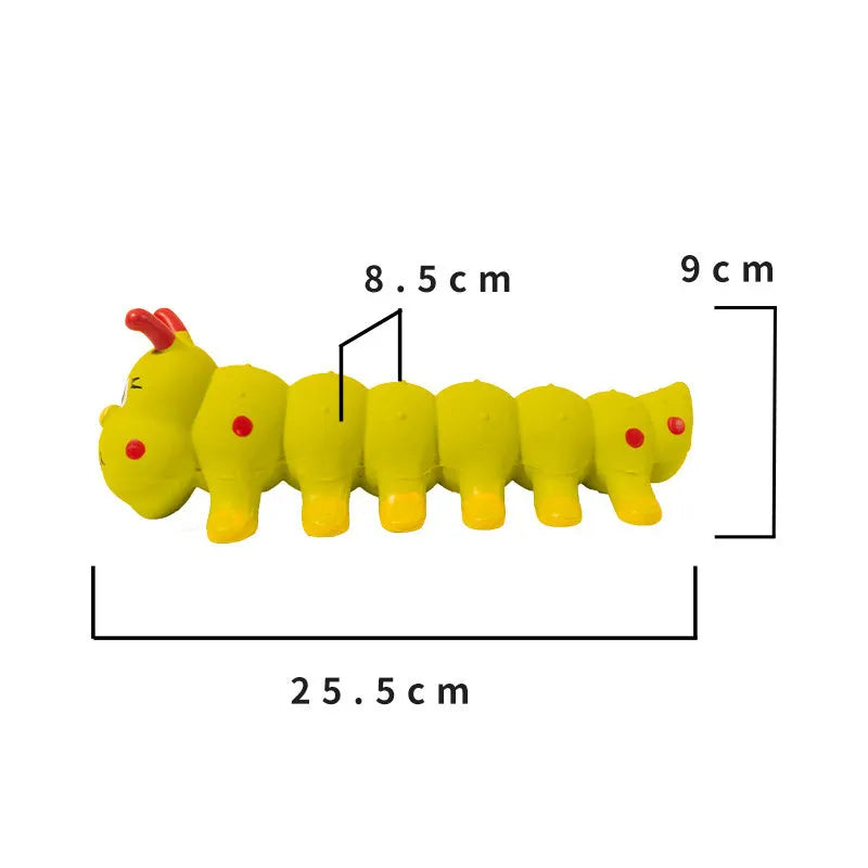 Yellow rubber caterpillar-shaped squeaky toy for dogs, shown next to a tape measure indicating 25.5cm length.