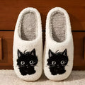 White plush cotton couple slippers with black cat cartoon design and non-slip TPR soles