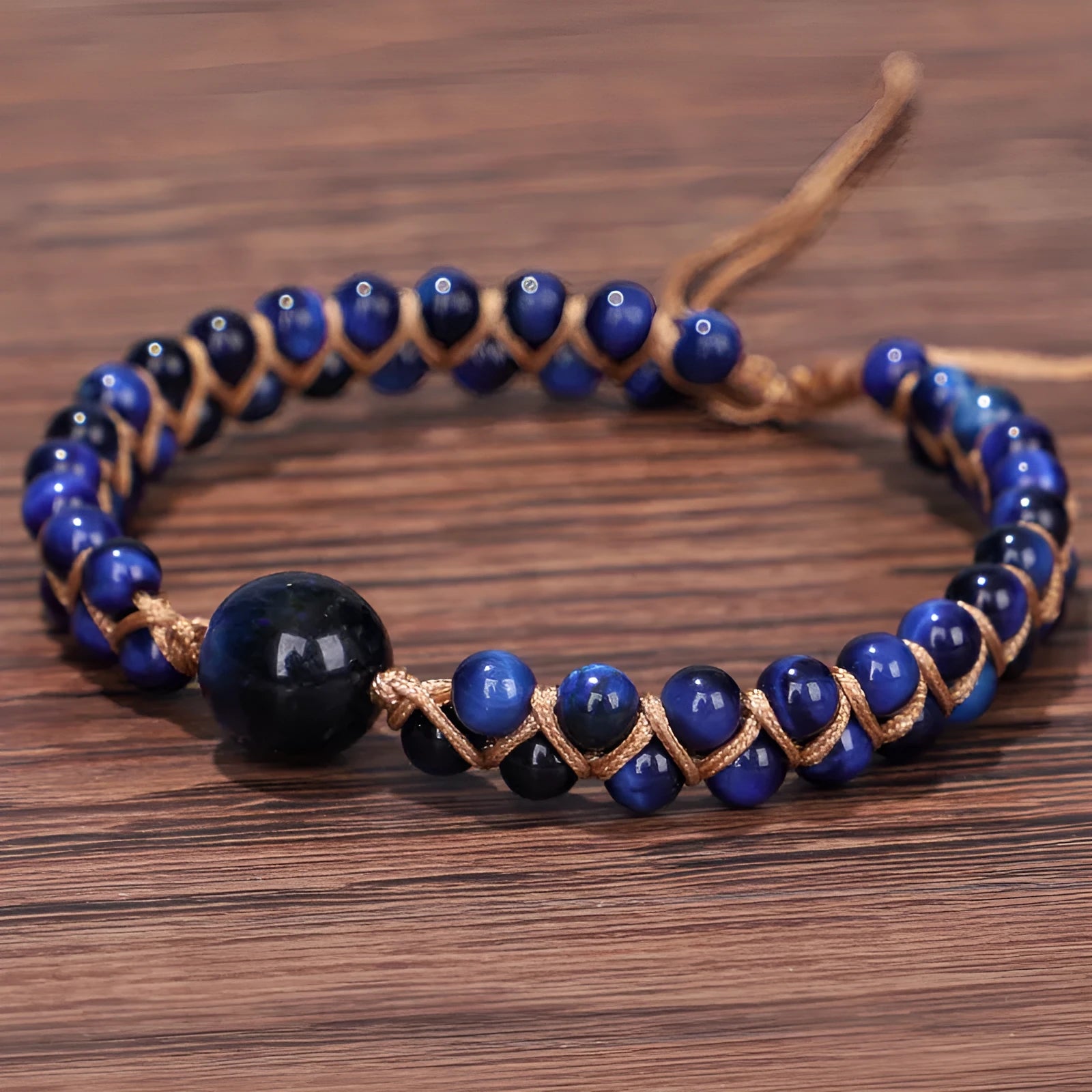 Handmade woven geometric pull bracelet with Tigereye stone beads in blue or amethyst colours