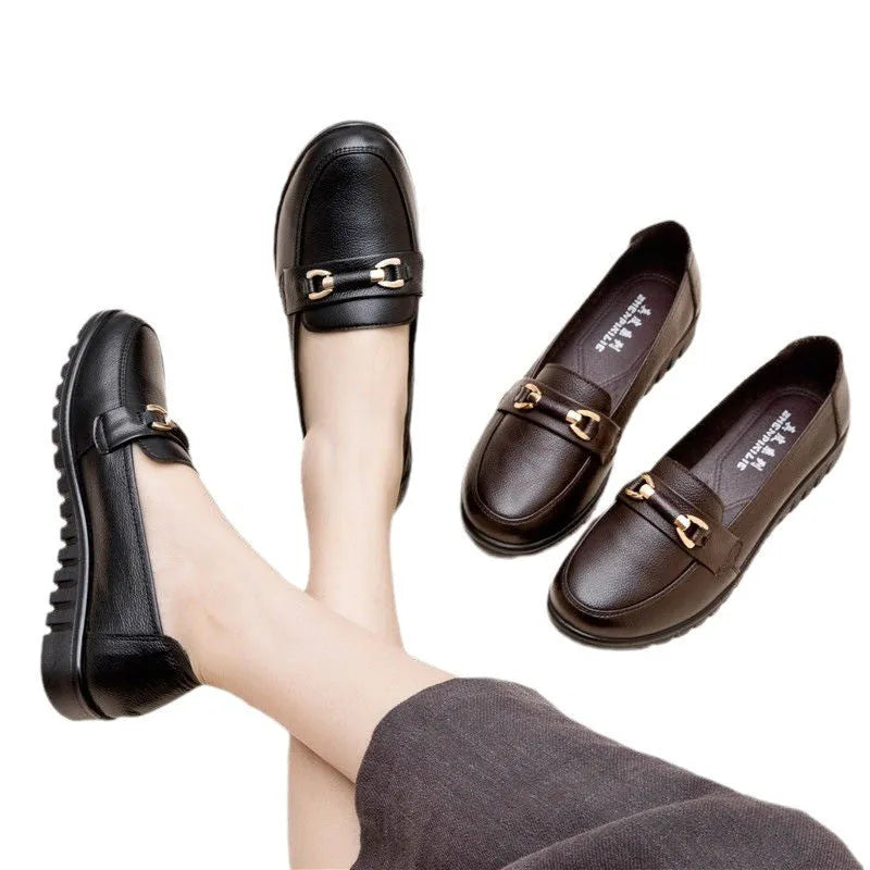Black soft leather women's pumps with round toe and low flat heel