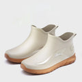 Men's short tube PVC rubber boots in beige, black, and black-red colours with non-slip sole