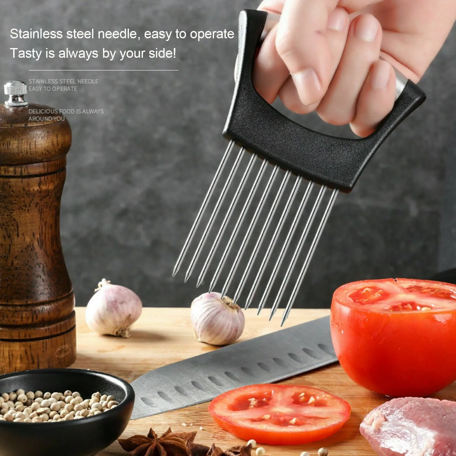 Stainless steel food slice assistant with ABS handle for stabilising onions and tomatoes during cutting