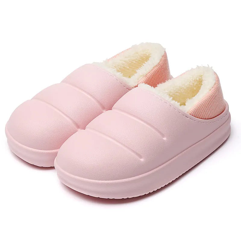 Yellow and green waterproof EVA winter house slippers with plush lining and non-slip sole.