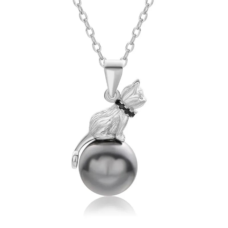 Sterling silver cat pendant necklace on a chain, showing elegant clavicle-length design.