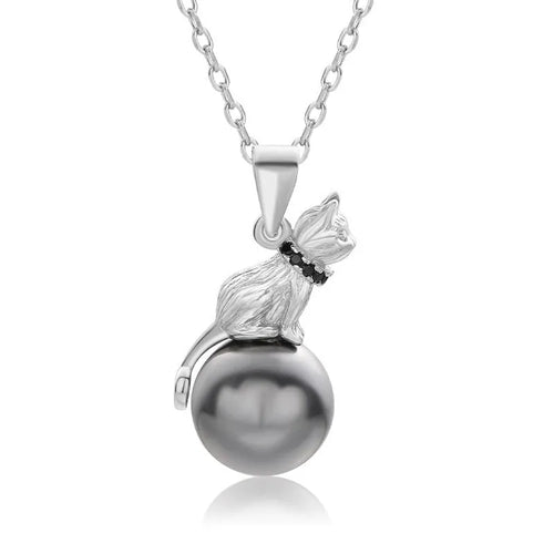 Sterling silver cat pendant necklace on a chain, showing elegant clavicle-length design.