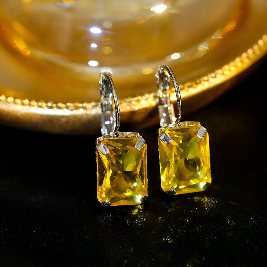 Women's square crystal earrings in purple colour on copper base, 25x10mm size pair