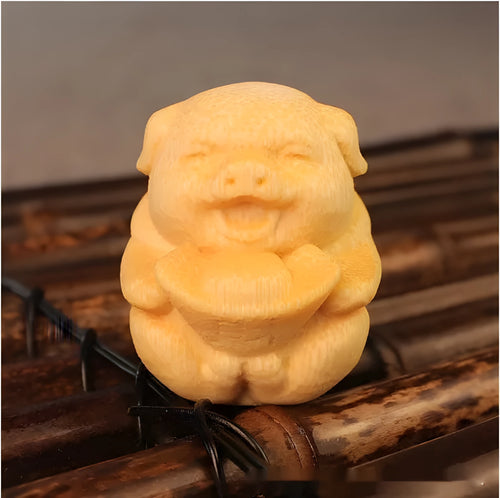 Solid bamboo carving ornament with cute pig ingot design measuring 4cm in height