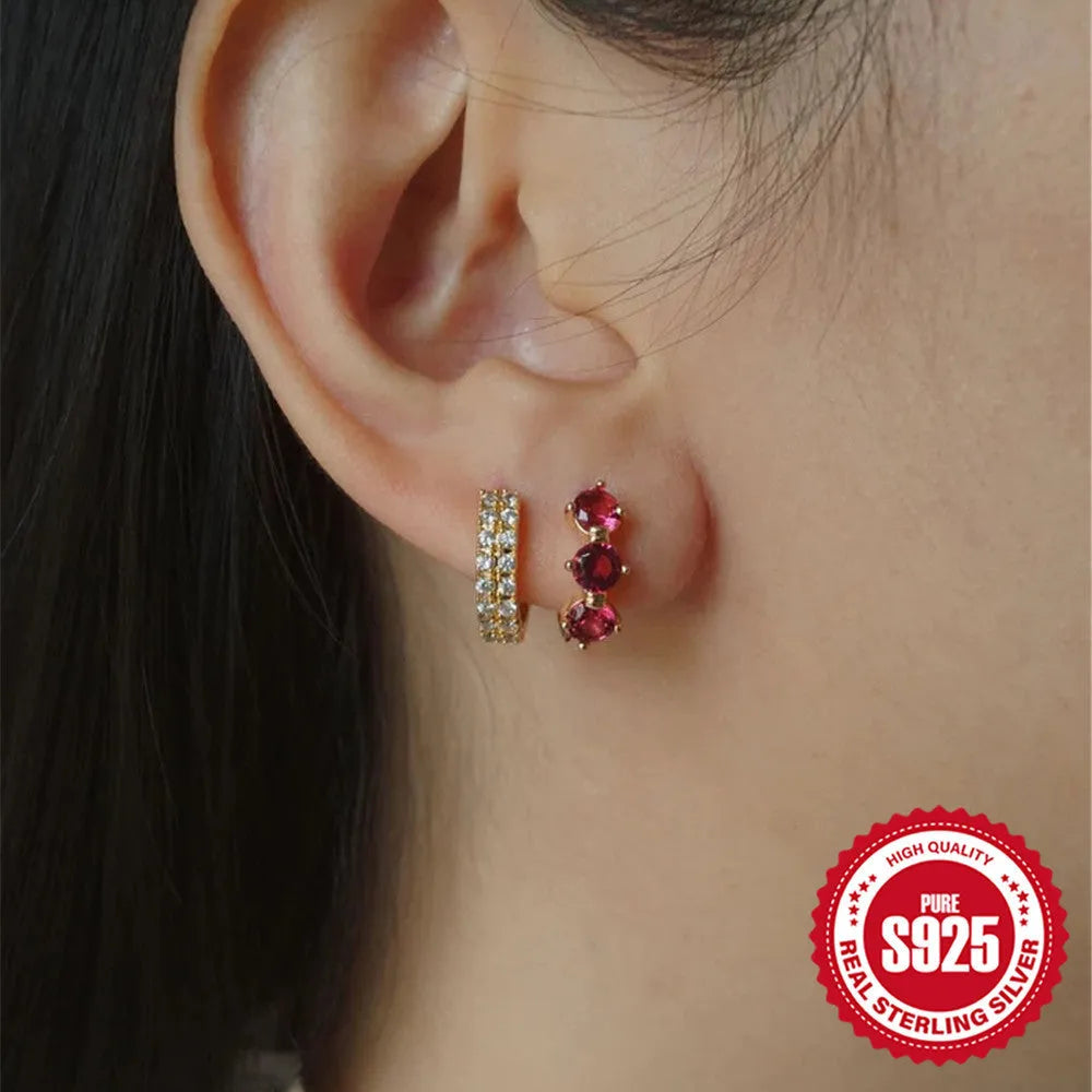 S925 sterling silver earrings with a geometric sunflower design and golden zircon inlay.