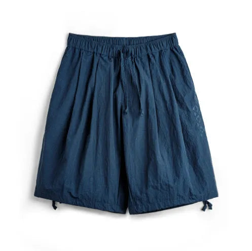 Prussian Blue men's loose fit nylon summer shorts with elastic waist and embroidered details