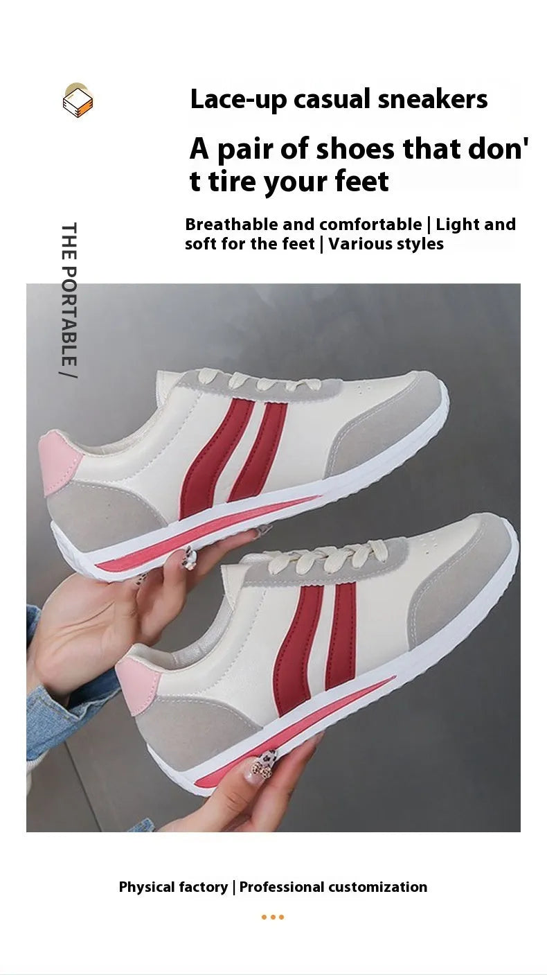 Red and blue lace-up low-top running sneakers with mesh upper and rubber sole on a white background.