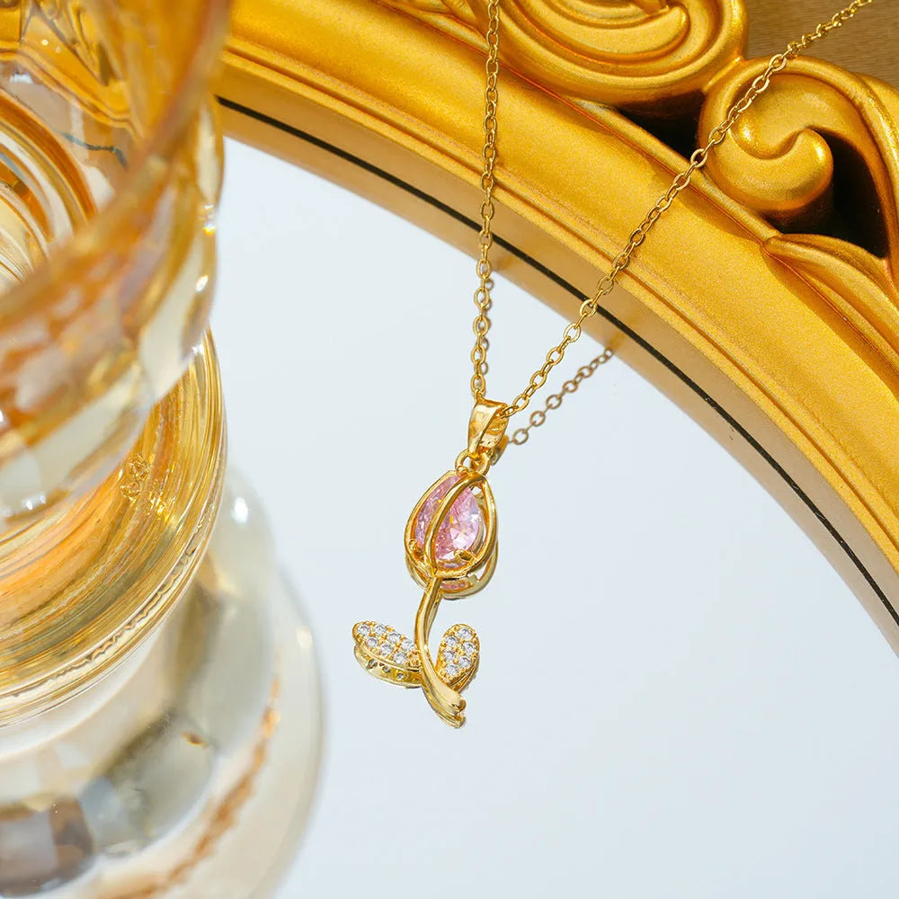 Gold-coloured tulip flower pendant necklace on a titanium steel chain for women.