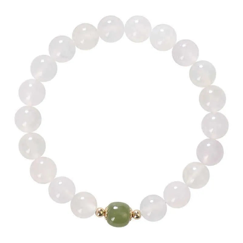 Handmade white agate bracelet with Hetian Jade and Cinnabar inlays showing 6mm and 8mm bead options