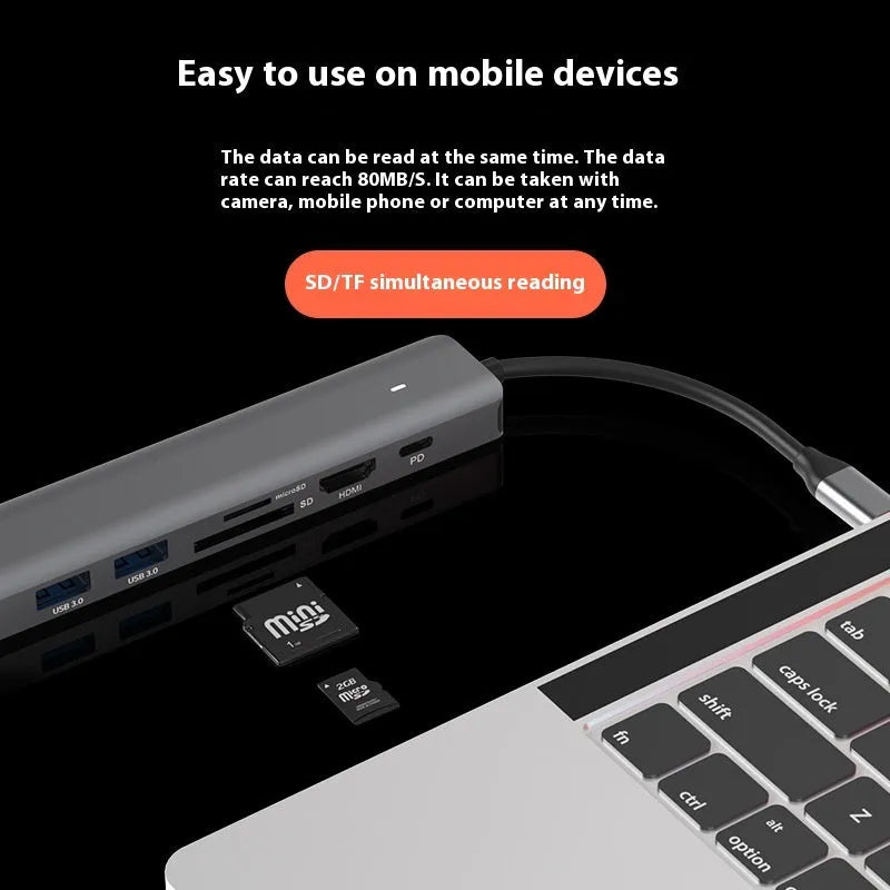 7-in-1 card reader and USB hub for laptops with multiple interface ports