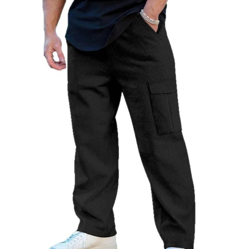 Men's loose-fitting corduroy cargo trousers in navy blue with straight wide-leg cut and elasticated waist