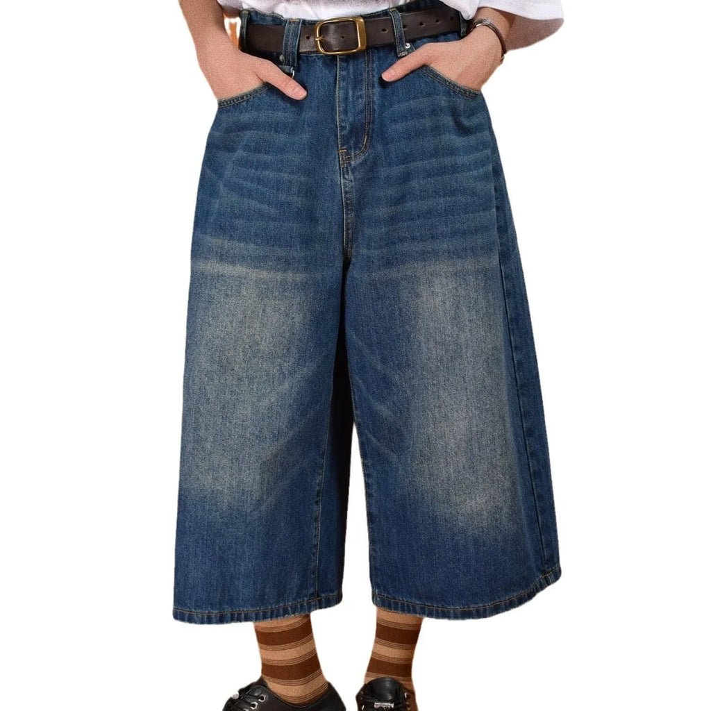 Men's straight-leg denim shorts in blue, shown with a loose fit for summer.