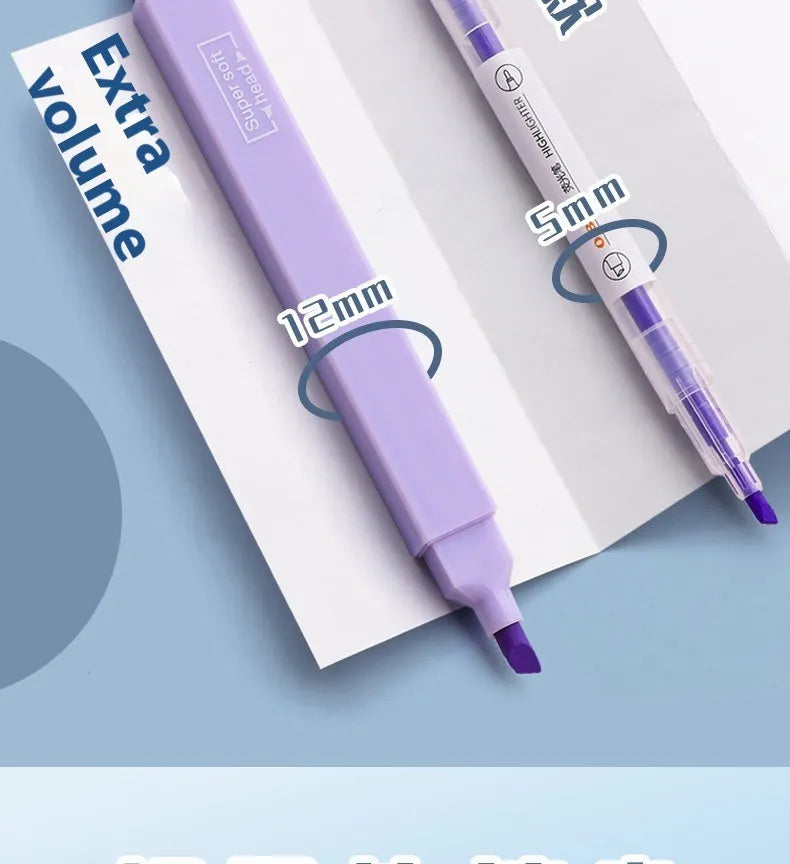 Fluorescent double-headed marking pens in mixed colour assortment with both broad and fine tips visible.